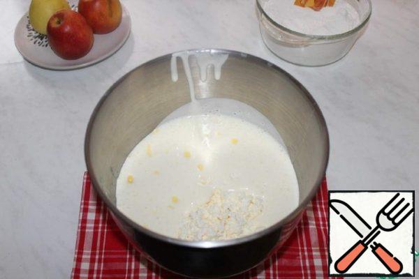 Add the melted butter and cottage cheese. Stir.