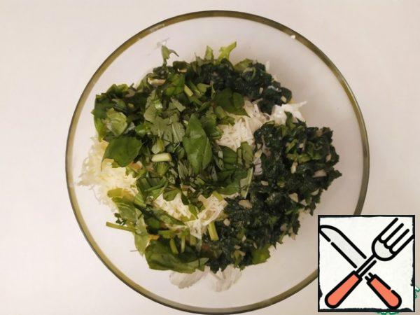 Add the ricotta, grated Parmesan, chopped fresh Basil, and roasted spinach and mix well.