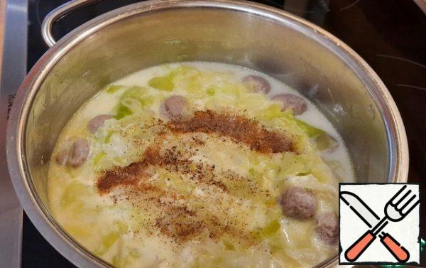 Add salt, pepper and nutmeg. Be careful with salt, the cheese is salty. Taste it and turn it off. Soup is ready!