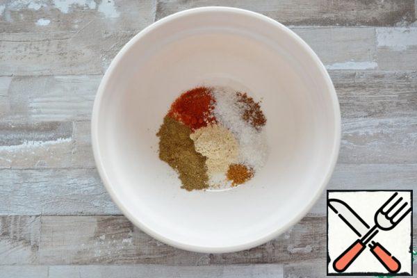 Take the spices you like.
I have the following composition:
1/2 tsp salt
1/2 tsp smoked paprika
1/8 tsp nutmeg
1/4 tsp coriander
1/2 tsp black pepper
1/2 tsp garlic powder