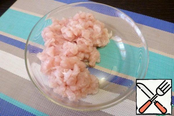 Cut the chicken breast into small pieces.