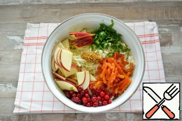 Add the sliced red Apple, chopped parsley, cranberries and chopped dried apricots.

Pre-wash dried apricots, if it is very dry, then fill with warm water for 5 minutes.

Cranberries can be put in a salad without defrosting, in the process of mixing it will defrost.

Add a teaspoon of grainy mustard to the salad and mix well.