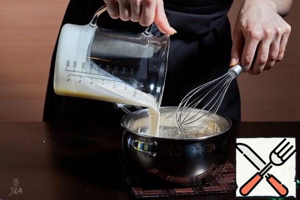 Mix thoroughly. Allow to cool slightly and pour out the remaining cold cream.