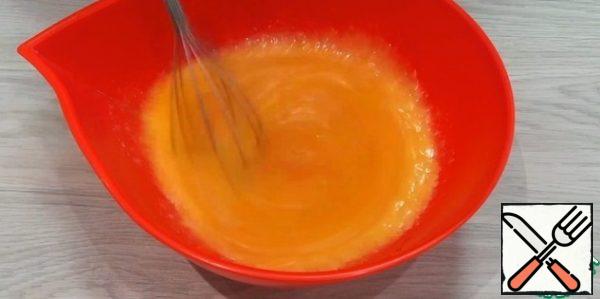 In a deep bowl, mix eggs with sugar, vanilla sugar and salt. Pour the melted, but not hot, butter, mix.