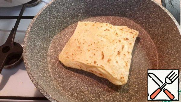 Fry in a dry pan on both sides.