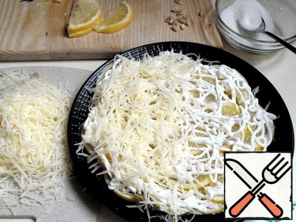 Again put the lemon slices + sugar + sour cream + sugar + cheese.