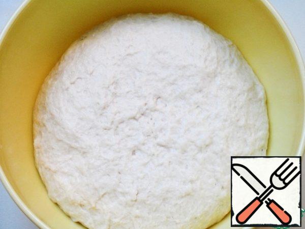 Continue kneading with your hands. The dough should be soft, if it sticks to your hands - brush with vegetable oil.