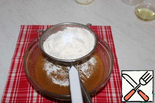 Add the sifted flour with baking powder.