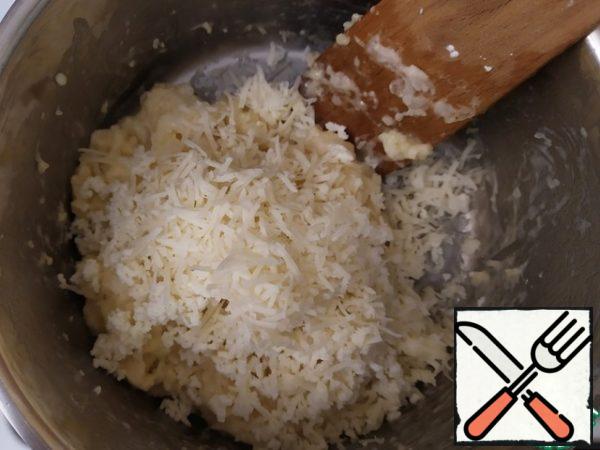 Add the cheeses.