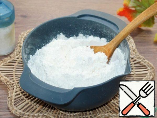 Mix flour (410 g) with salt (1 tsp) and sift.