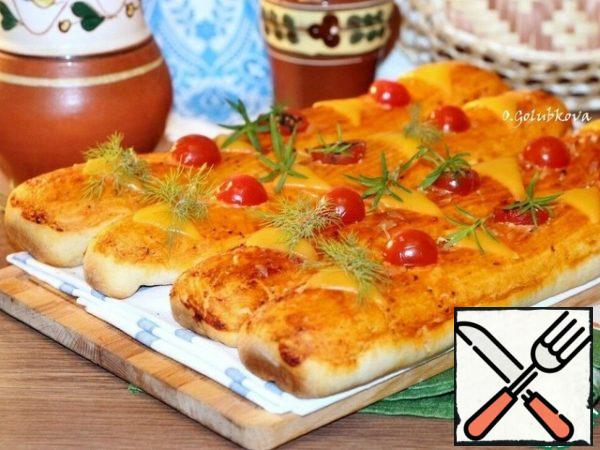 Put the pan with baguettes in the oven preheated to t 220-230 C, for 20-25 minutes or until Golden brown. Soft, spicy, and delicious baguettes with filling are ready!

