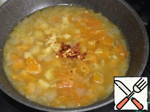 Add salt, chopped ginger, curry and chili flakes. Boil.