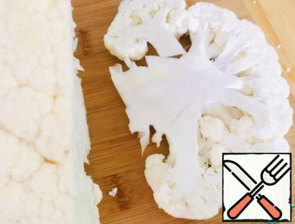 Cut a slice of cauliflower from the fork.