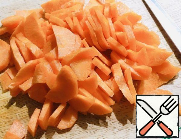 Slice the carrots.
