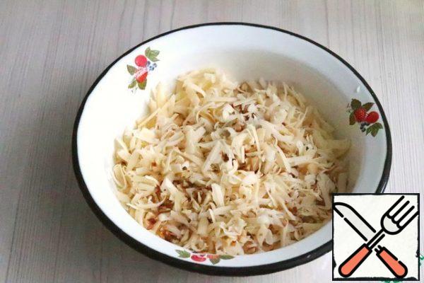 Mix with a bowl of walnut crumbs and cheese.