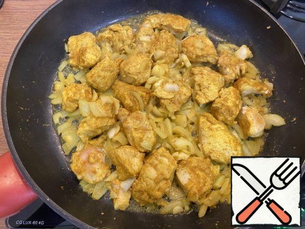 As soon as the chicken pieces turn white from the bottom, turn them over, add a little water if necessary, so as not to burn, cover with a lid and simmer over medium heat for 30 minutes. Periodically check whether the water has completely boiled off.