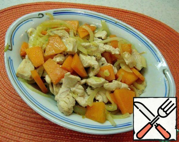 Combine chicken breast with vegetables.