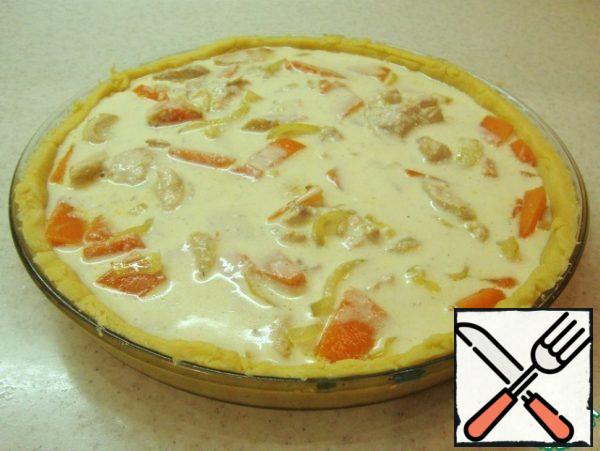 Pour in the cream and egg mixture.