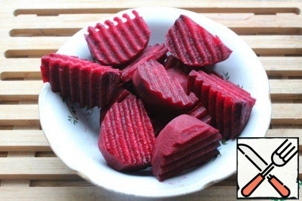 Peel the beets and cut them large - I cut each one into 6 parts.