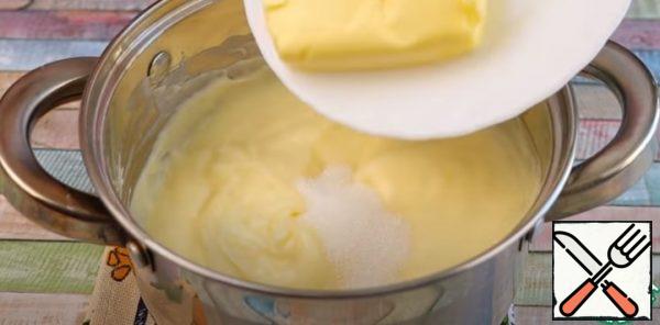 Then add the butter and vanilla sugar and leave to cool to room temperature.