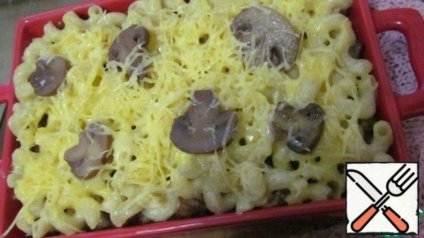 Garnish with mushrooms, finely grated cheese and green onions.