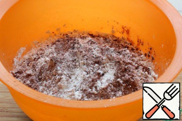 Add flour and cocoa powder.