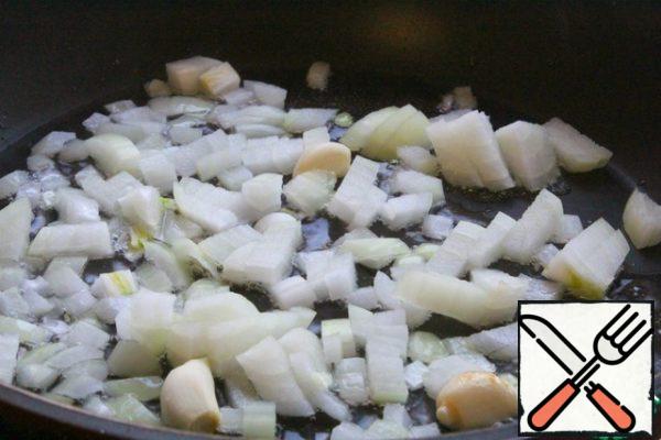 Add the onion and fry for a couple of minutes.