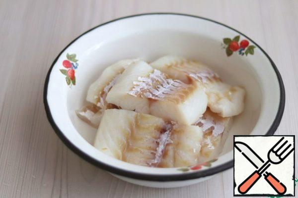 Cod fillet (700 gr.) cut into slices.