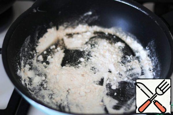 Add 1 tablespoon of flour to the pan and fry the flour until light cream color and nutty smell.