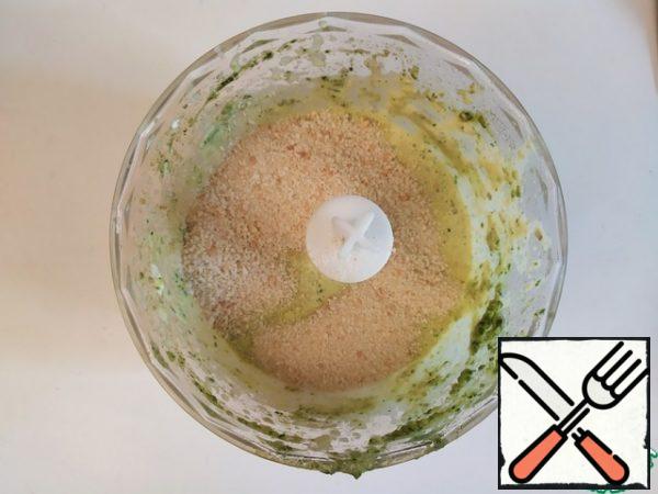 Add the breadcrumbs and mix again.
