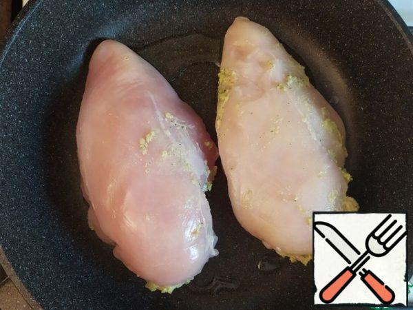 Heat the olive oil and fry the Breasts for 30 seconds on each side. Set aside and allow to cool.