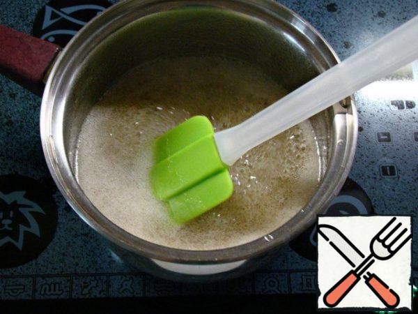 Bring the syrup to a boil, turn down the heat and boil the syrup for 4 minutes until the sample is on a thin, continuous thread flowing from the spatula or up to 110 *C degrees.