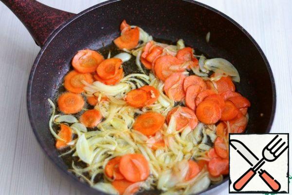 Saute the onion and carrot until light Golden brown.