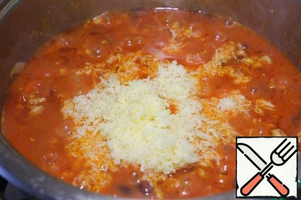Add the grated cheese, stir, then cook for a couple of minutes.
Done. Adjust to taste.

