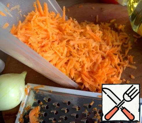 Grate the carrots on a medium or large grater.