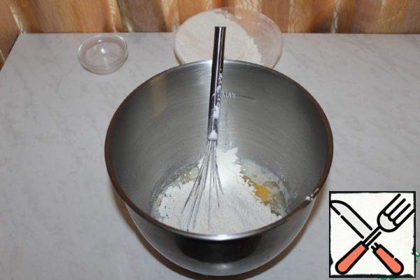 Gradually add the flour.