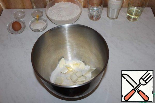 Add sugar and chilled butter to the flour.