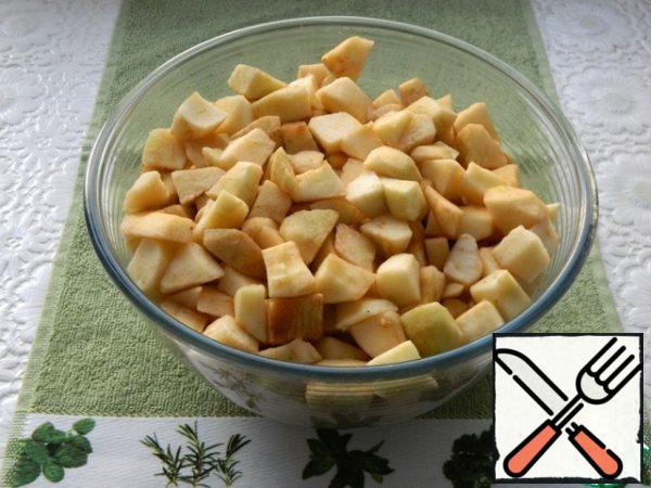 Peel the apples and cut them into small pieces.