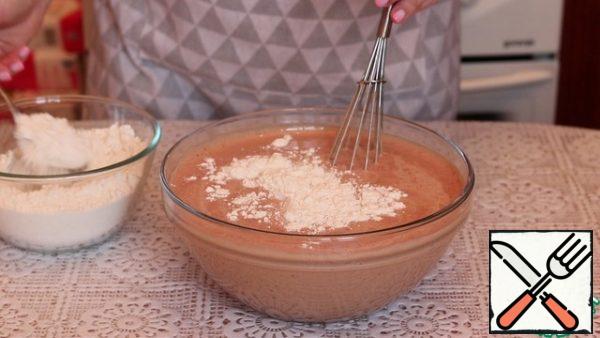 Pour into a large bowl. Add milk, flour and mix thoroughly. The consistency should resemble the dough for pancakes.