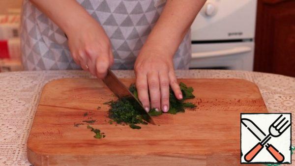 Finely chop the dill and parsley.
