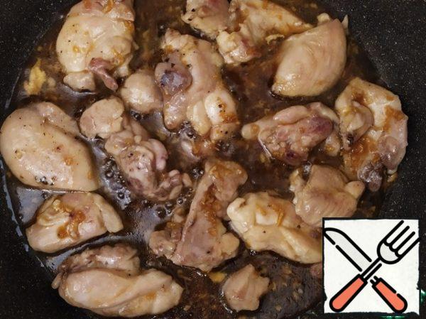 Pour in the sauce and simmer until the chicken is tender and the sauce thickens, about 3-5 minutes.