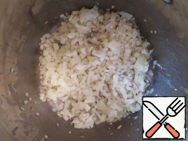 Add more oil if necessary. Fry the onion for a couple of minutes.