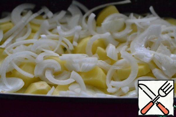 Put a layer of potatoes, then a layer of onions.