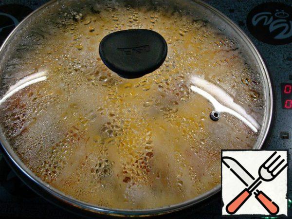 Cover the pan, bring to a boil, reduce the heat and simmer for about 35-40 minutes.