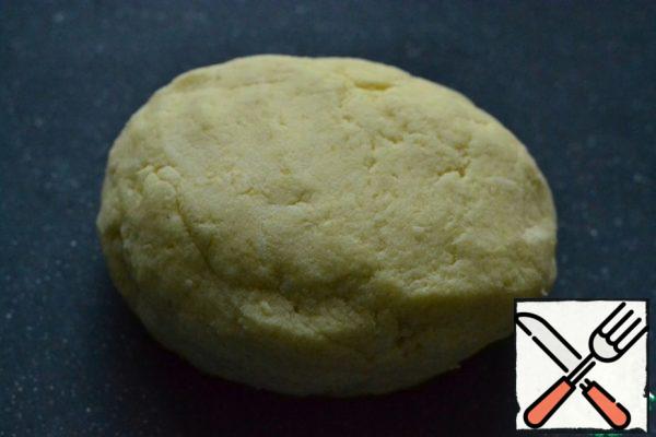 Gradually add the butter and remaining flour to knead the dough.