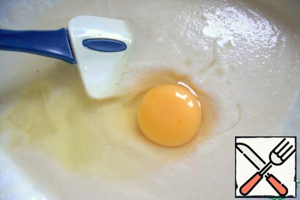 Beat in an egg.