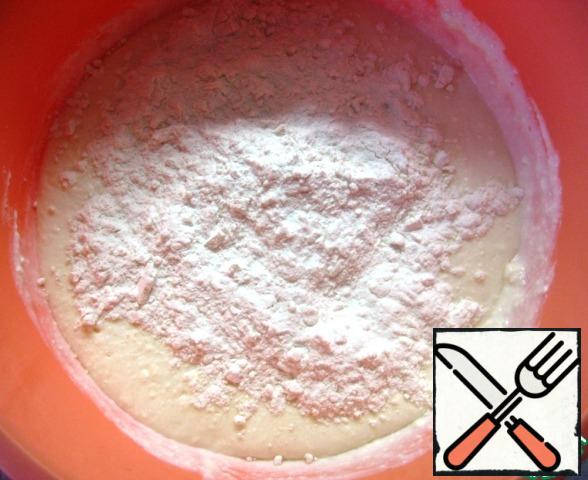 Add the flour and mix the dough until smooth.