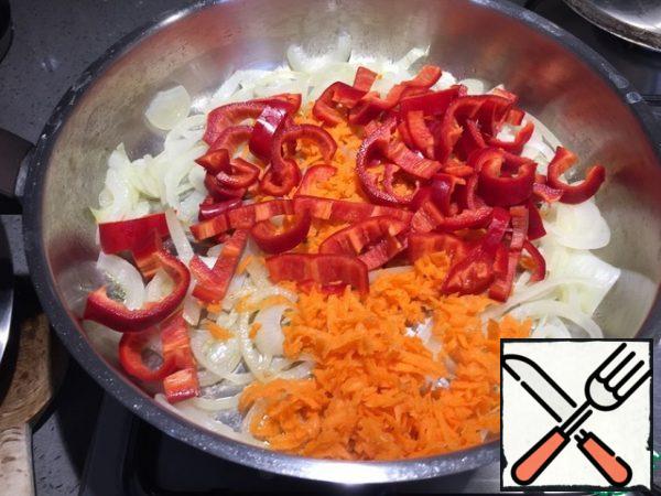 Then add the carrots and bell pepper. Stir and simmer on low heat for 5-10 minutes. Be sure to cover with a lid.