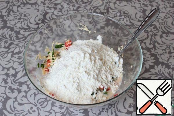 Mix the flour with baking powder. Add half the flour to the dough.