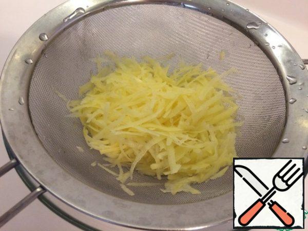 RUB the potatoes and rinse with water.